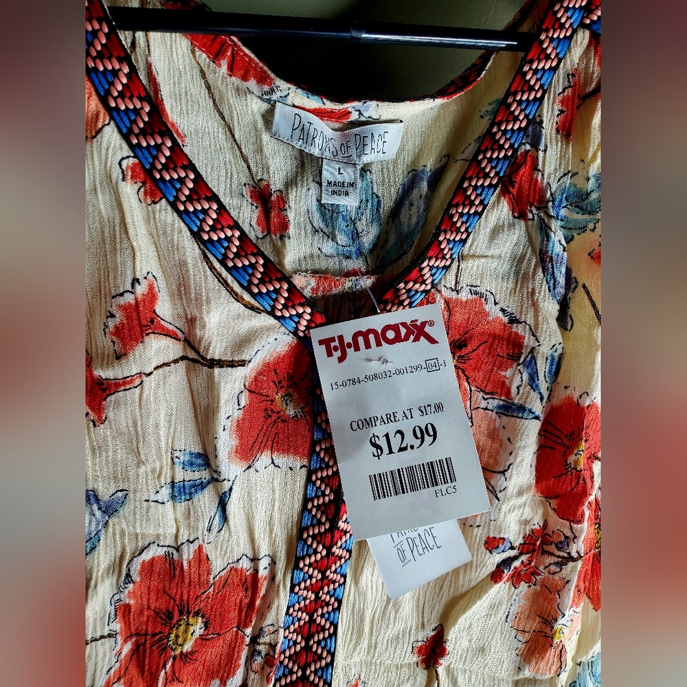 Floral Sleeveless Top with Ruffle Hem - Picture 3 of 4